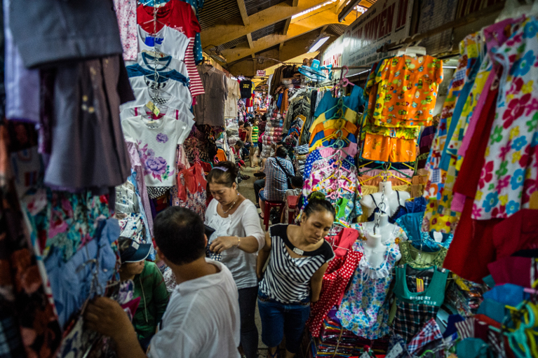 Shop owners see a rise in sales as better roads bring in more customers. Photo: ADB.