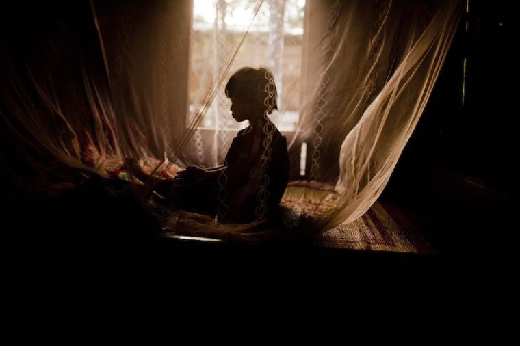 Mosquito nets protect children against malaria in Viet Nam. Photo: Justin Mott/ADB.